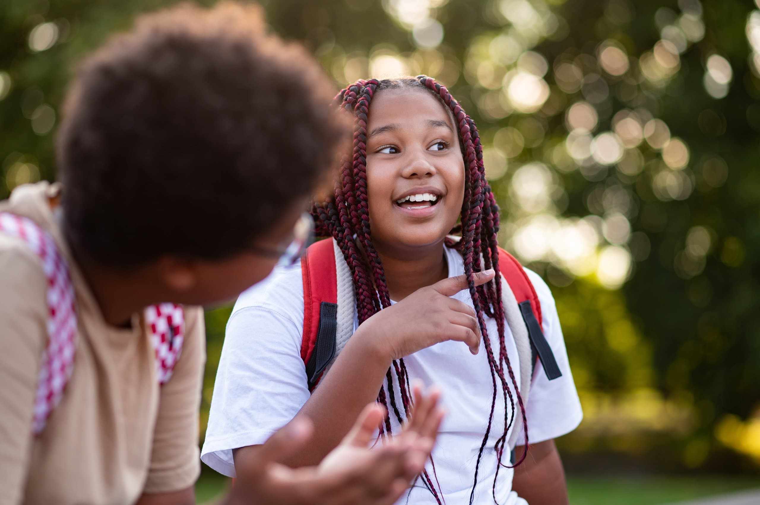 two young students talking