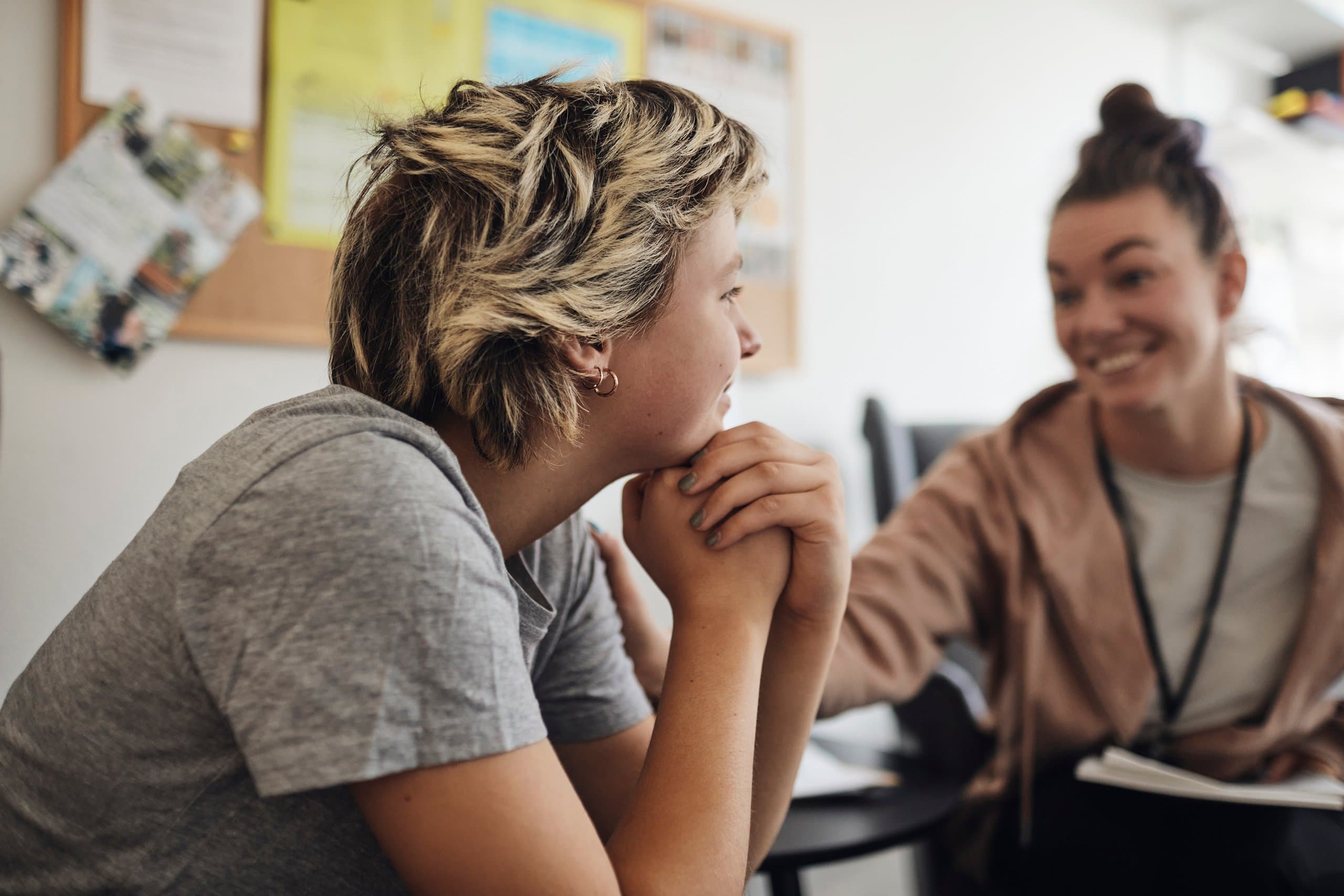 teenager listening to counsellor